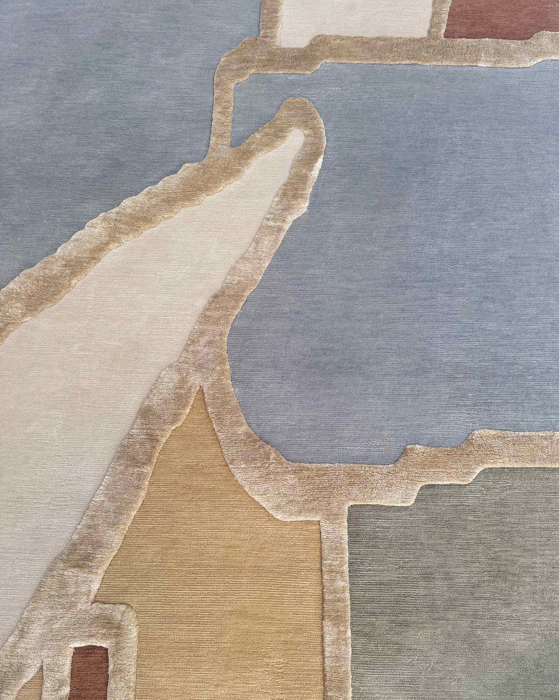 Close-up rug image of Pieces Mineral – a multicolored oval-shaped area rug with a geometric pattern | Eskayel