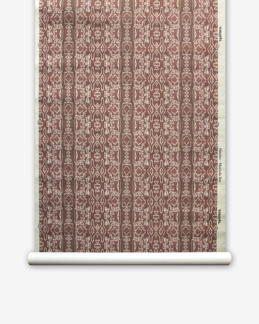 A roll of Akimbo Grasscloth Morinda Ikat wallpaper featuring an Akimbo design in brown and white