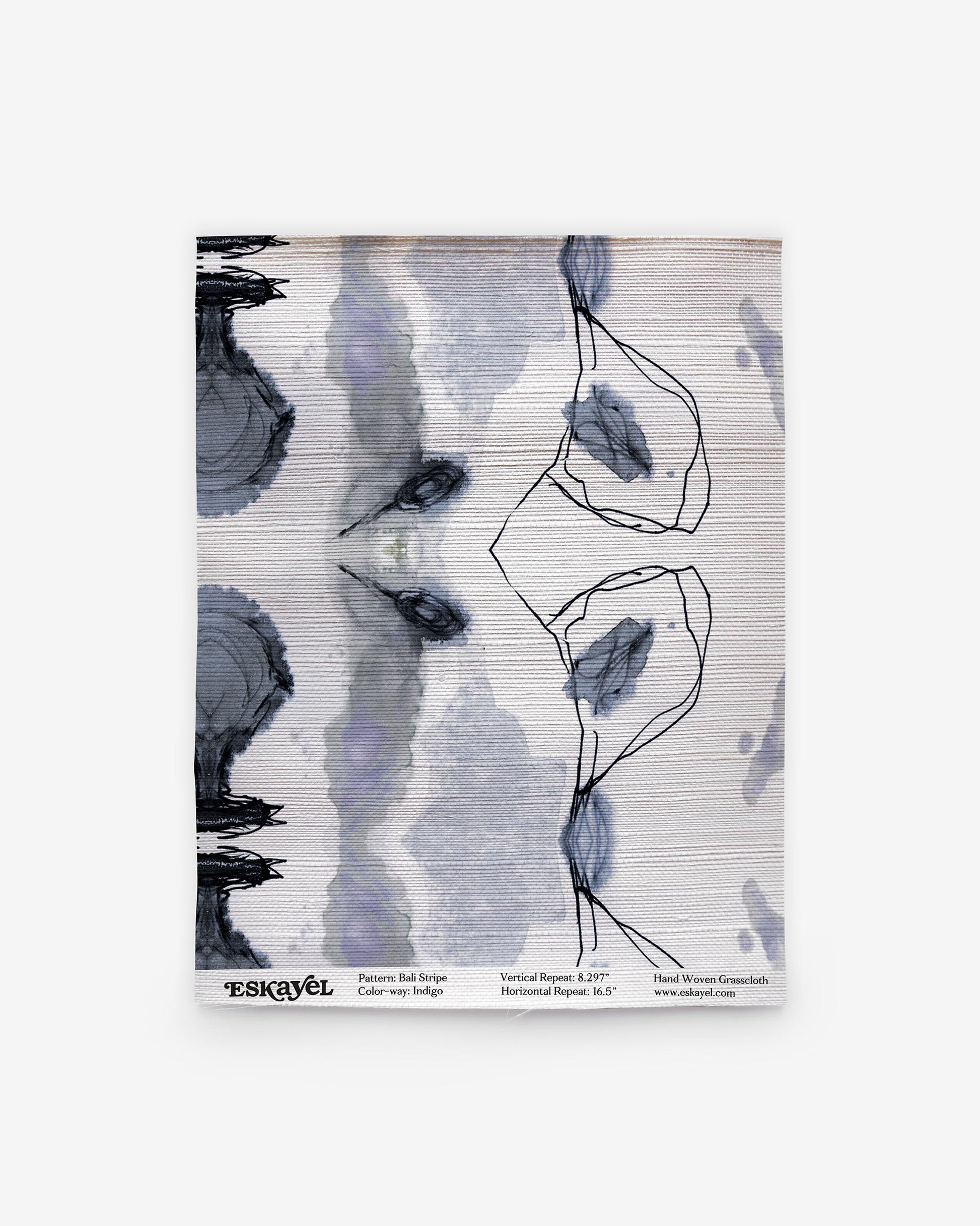 An abstract watercolor painting featuring Bali Stripe Grasscloth||Indigo hues on a white background.