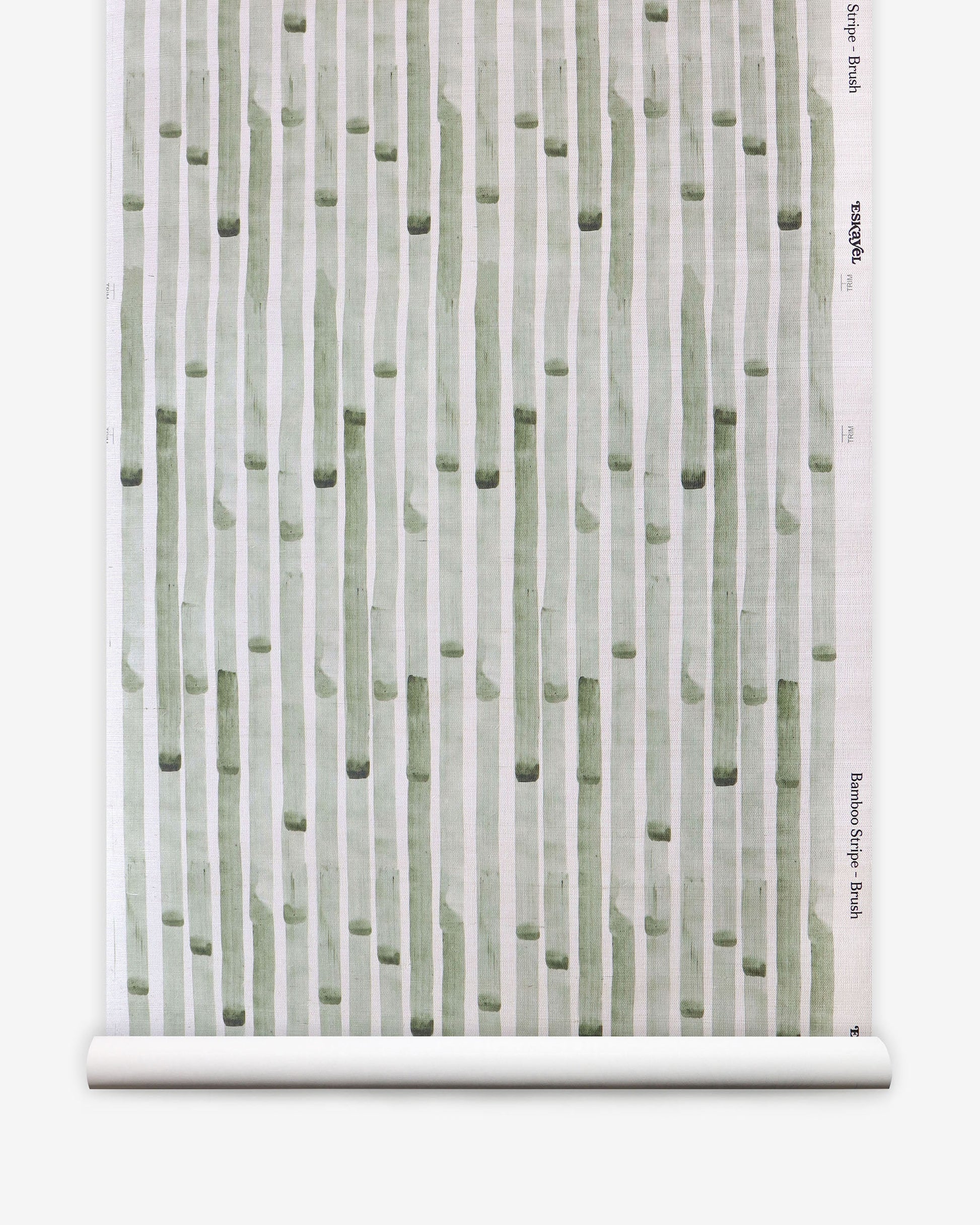 A green and white Bamboo Stripe Grasscloth Brush wallcovering on a roll