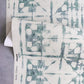 A piece of wallpaper with a Banda Grasscloth Chloros pattern on it
