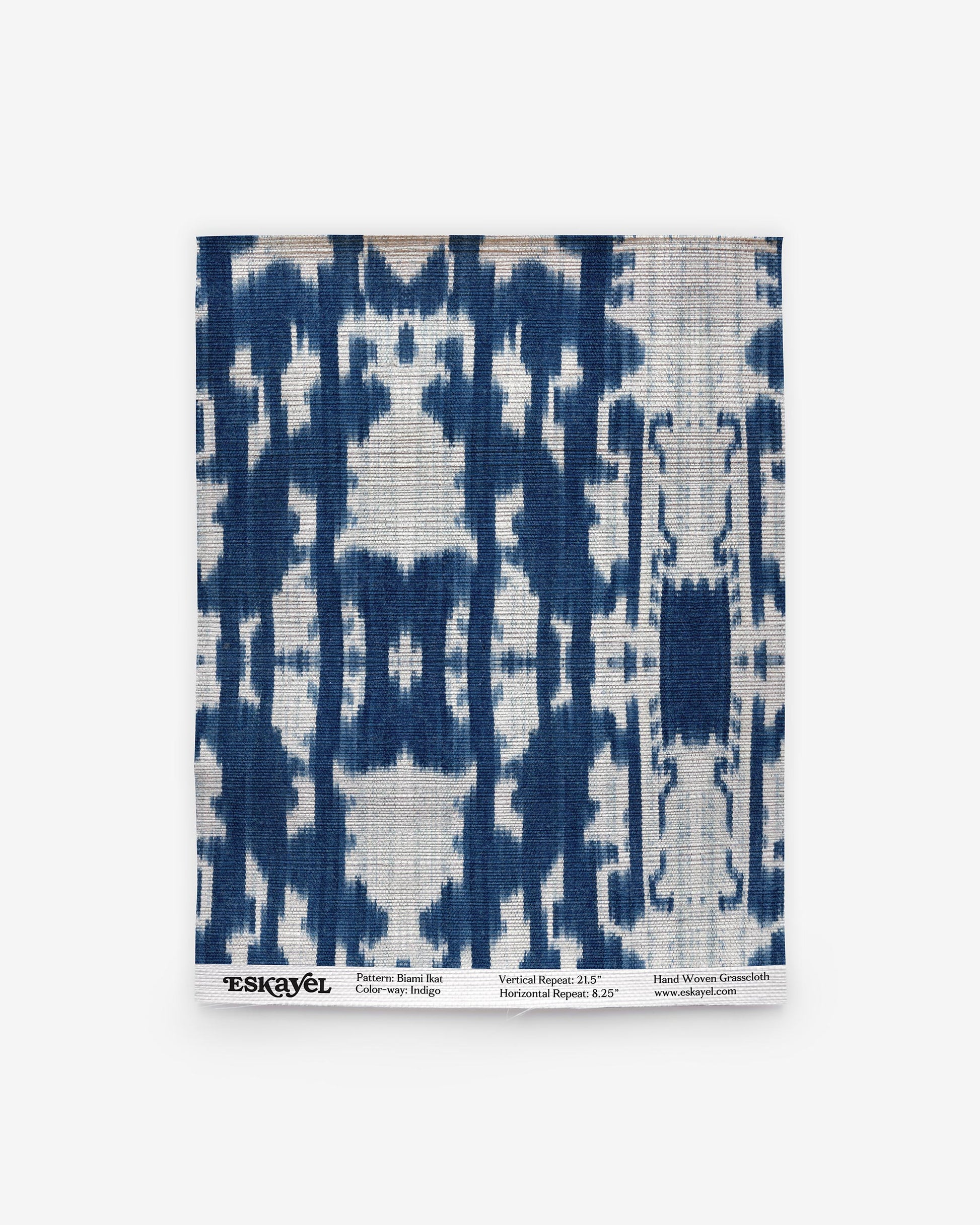 A blue and white Biami Grasscloth Sample||Indigo ikat pattern on a white background is available for order.