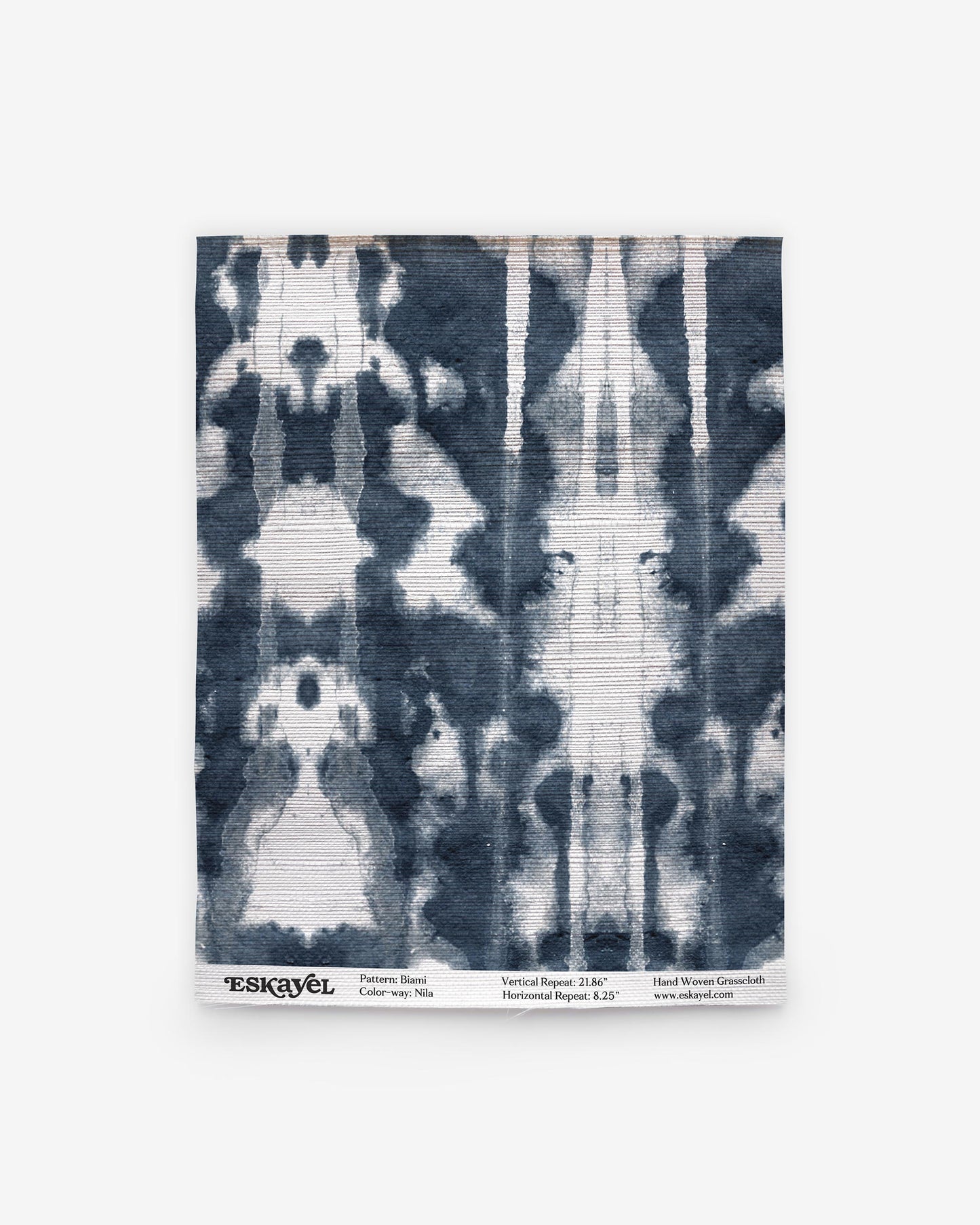 A blue and white tie dye pattern on a Biami Grasscloth Sample Nila