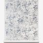 A blue and white marble Bosky Toile Grasscloth Midnight on a roll