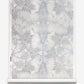 A roll of Laurel Forest Grasscloth Dove wallpaper with a floral pattern on it