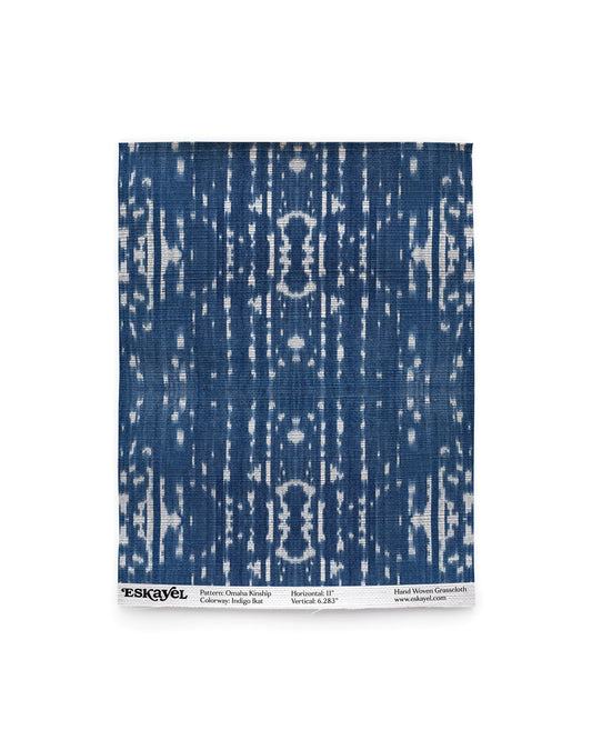 To get an idea of the pattern, an Omaha Kinship Grasscloth Sample Indigo ikat with the indigo and white design on a blue background