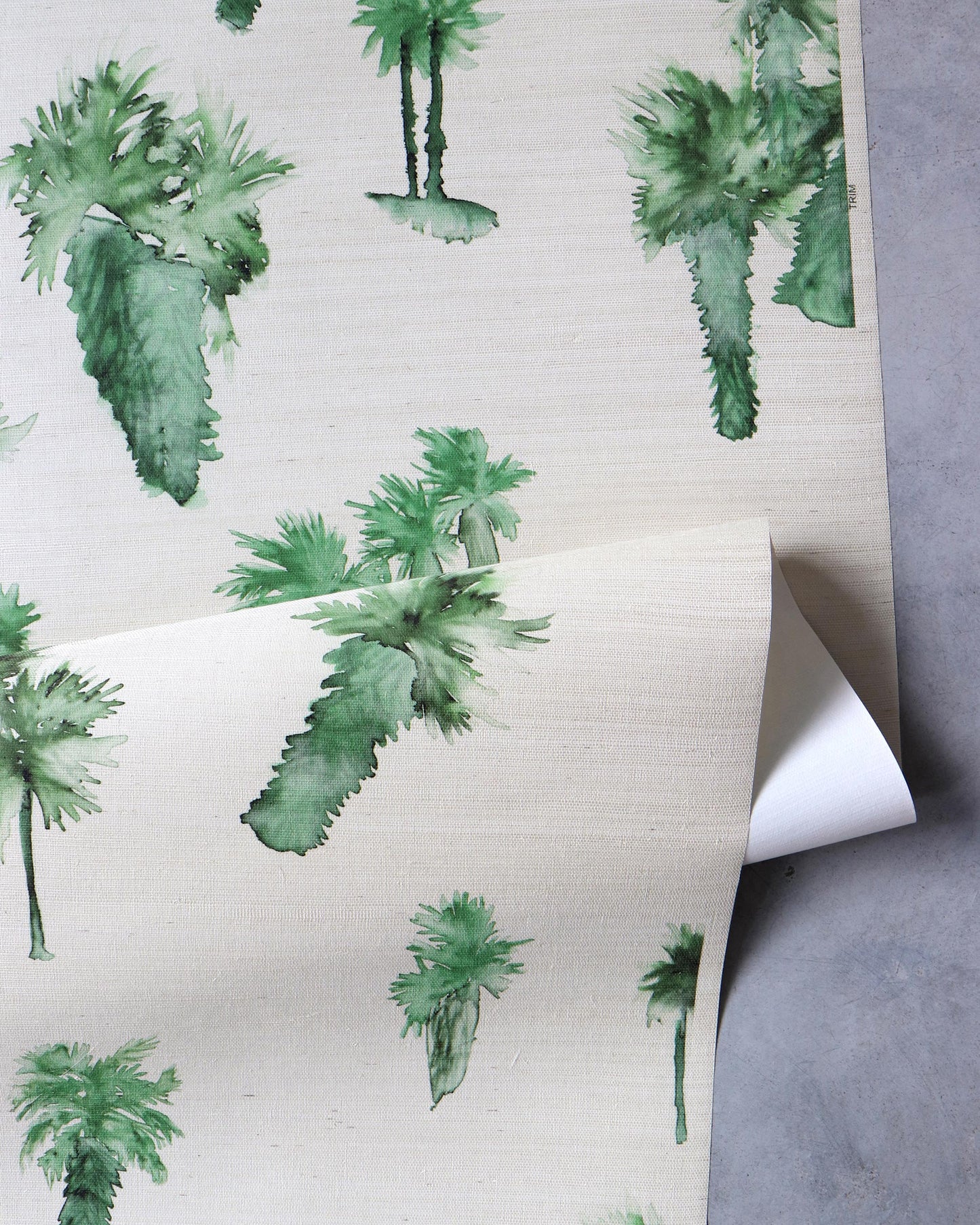 A figurative pattern with Perfect Palm Grasscloth Chloros in a watercolor style