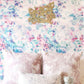 A bed with pillows and custom Felidae Wallpaper||Spectra.