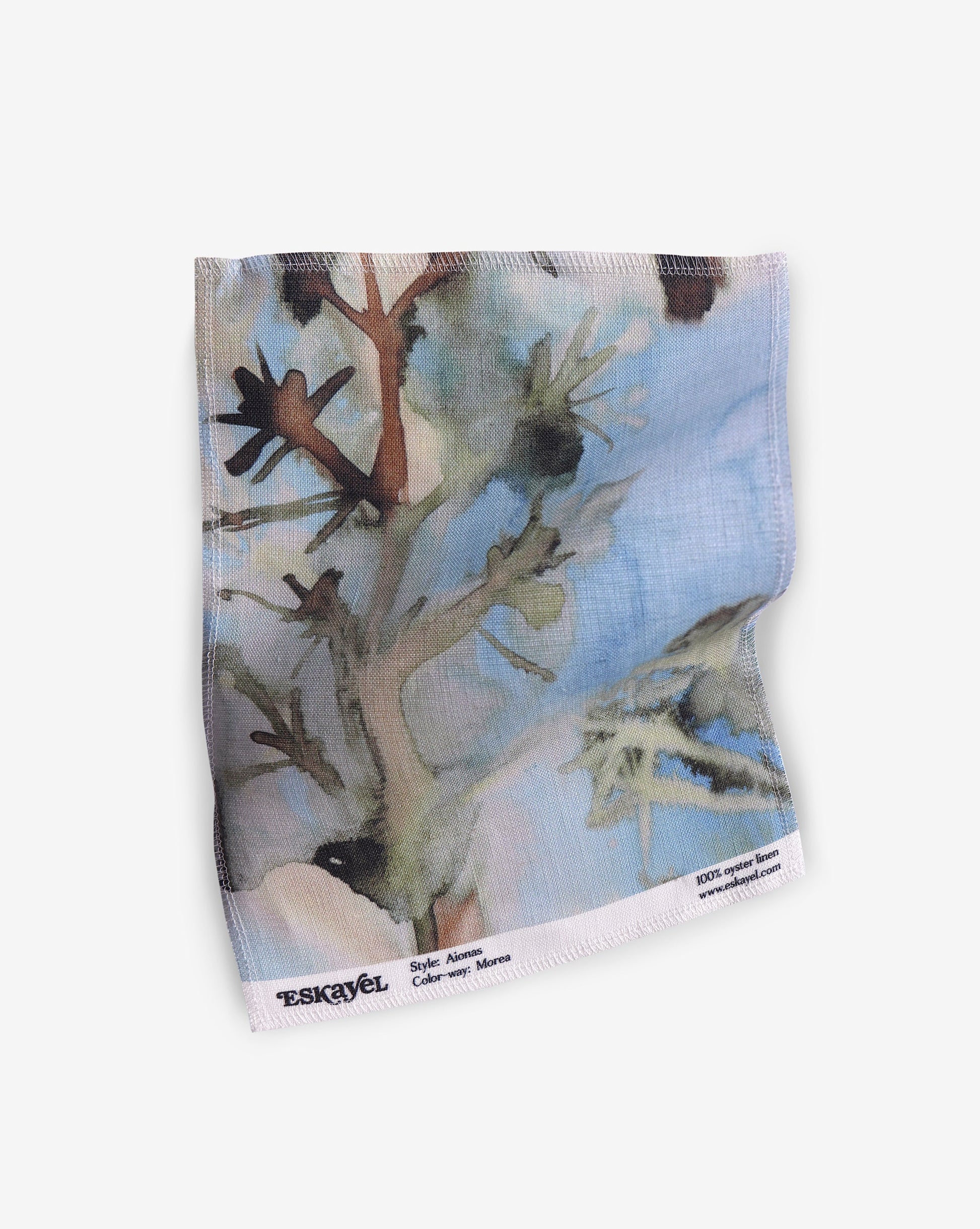 A Aionas Fabric Sample||Morea handkerchief with an image of a tree.