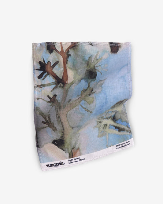 A Aionas Fabric Sample Morea fabric with an image of a tree
