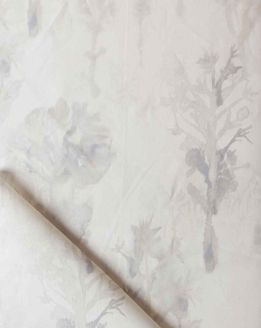 A high-end Aionas Fabric||Sol wallpaper with a white and blue floral pattern on a white sheet.