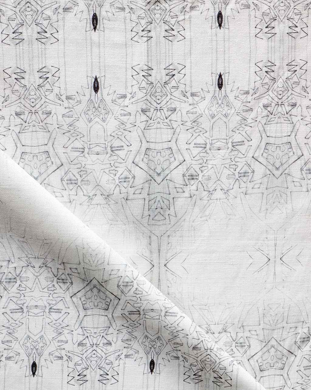 Akimbo 1 Fabric Greyscale: A monochrome fabric with a geometric pattern on it
