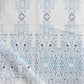 A Akimbo 2 Fabric||Aura and white pattern on a fabric.