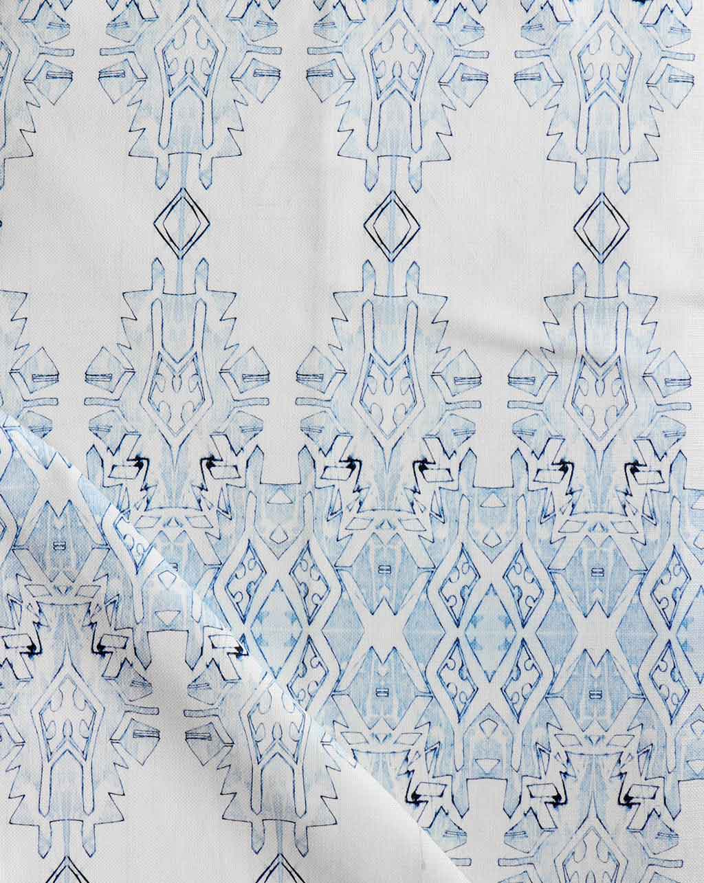 A Akimbo 2 Fabric||Aura and white pattern on a fabric.