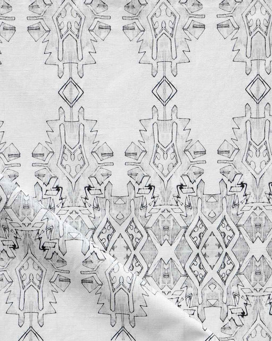 A versatile Akimbo 2 Fabric Greyscale with a graphic geometric pattern on it
