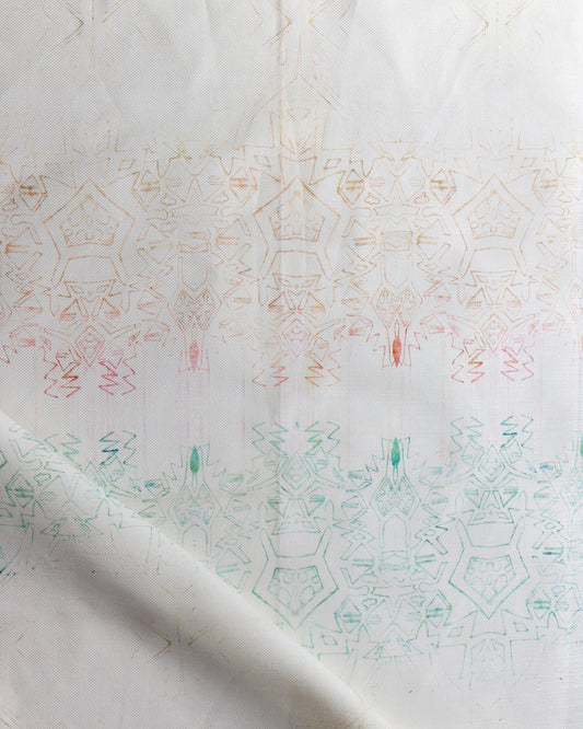 A white piece of Akimbo 1 Fabric with a luxurious geometric pattern.