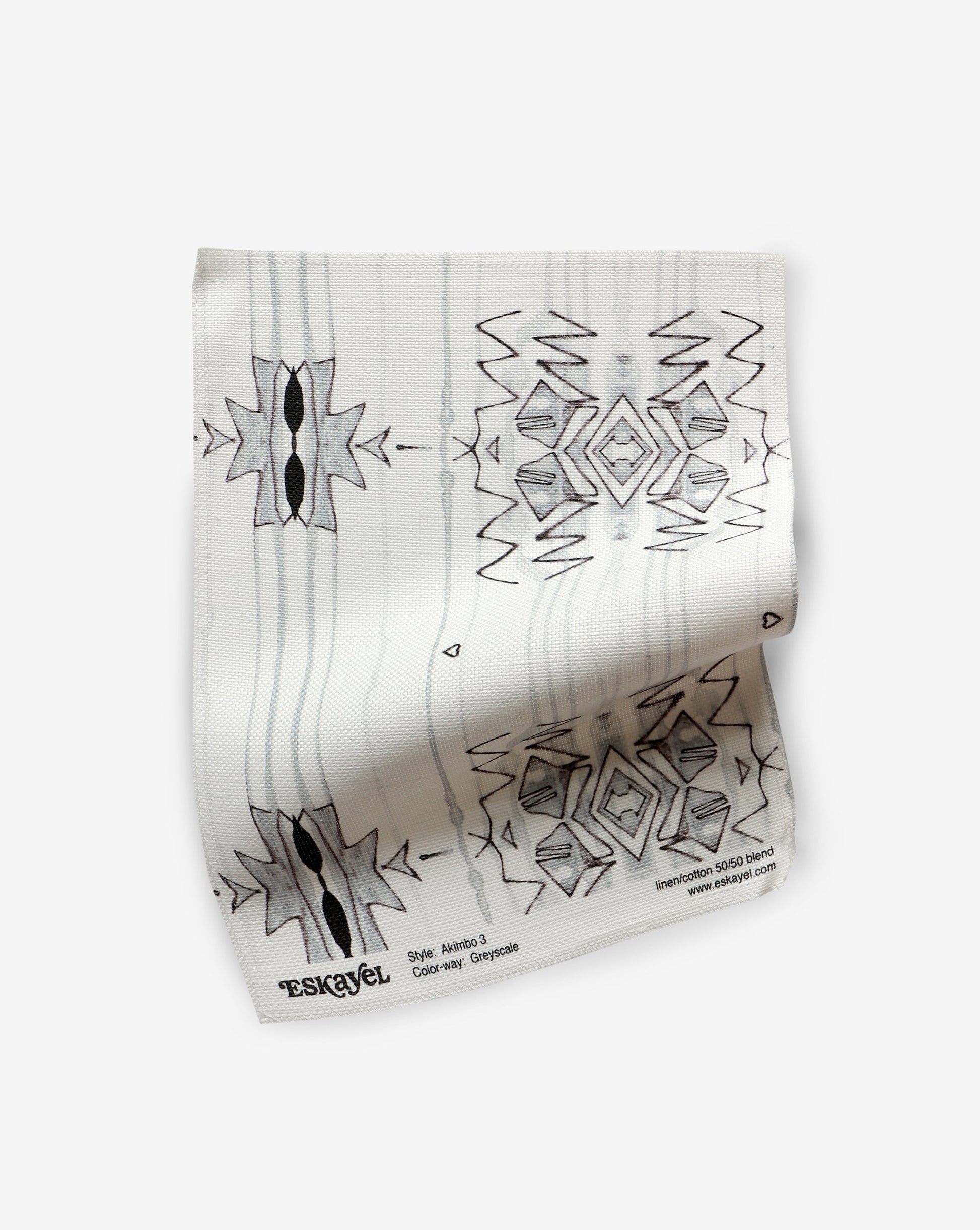 A versatile Akimbo 3 Fabric Greyscale fabric with a graphic geometric pattern on it