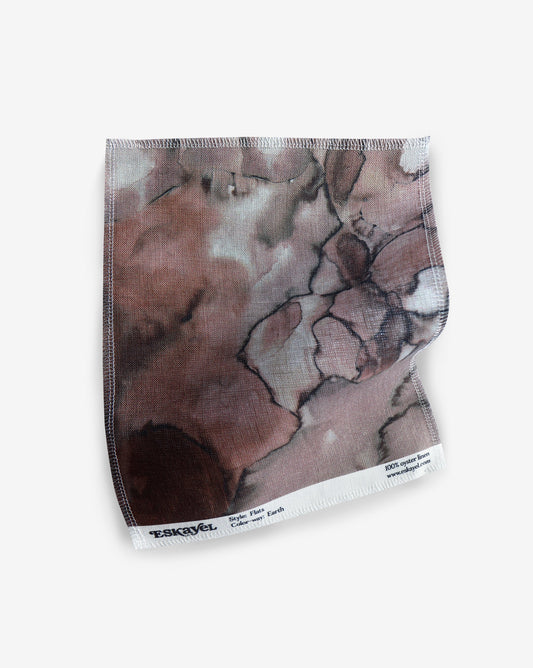 an Aquarelle Fabric Sample Earth with a pink and brown marble pattern