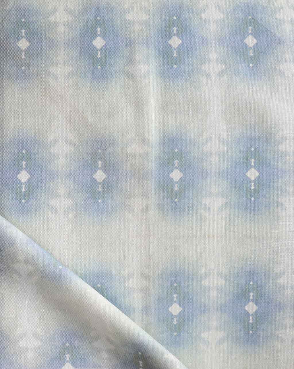 An Areca Palms Fabric Mist, a blue and white fabric with a geometric pattern, inspired by the oceanic art of the Kwoma people from Papua New Guinea