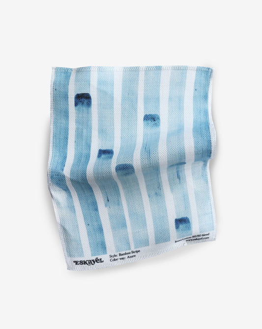 A sample of Bamboo Stripe Fabric Sample Azure, a blue and white fabric with stripes on it