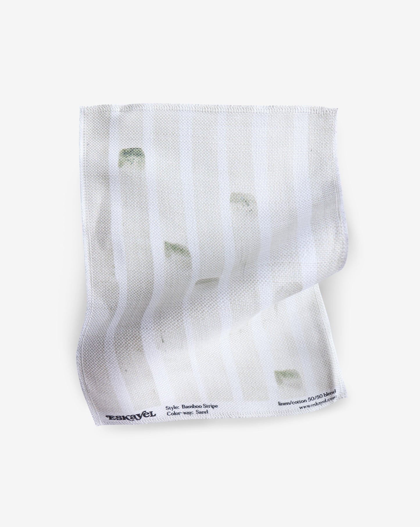 A white Bamboo Stripe Fabric hankerchief with green stripes on it