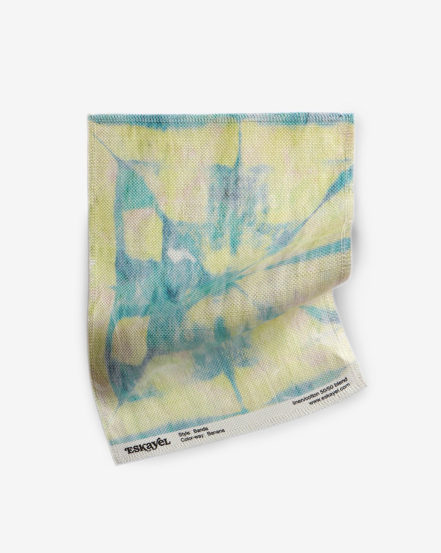 A piece of Banda fabric with a high-end blue and yellow pattern, created using shibori tie-dye techniques