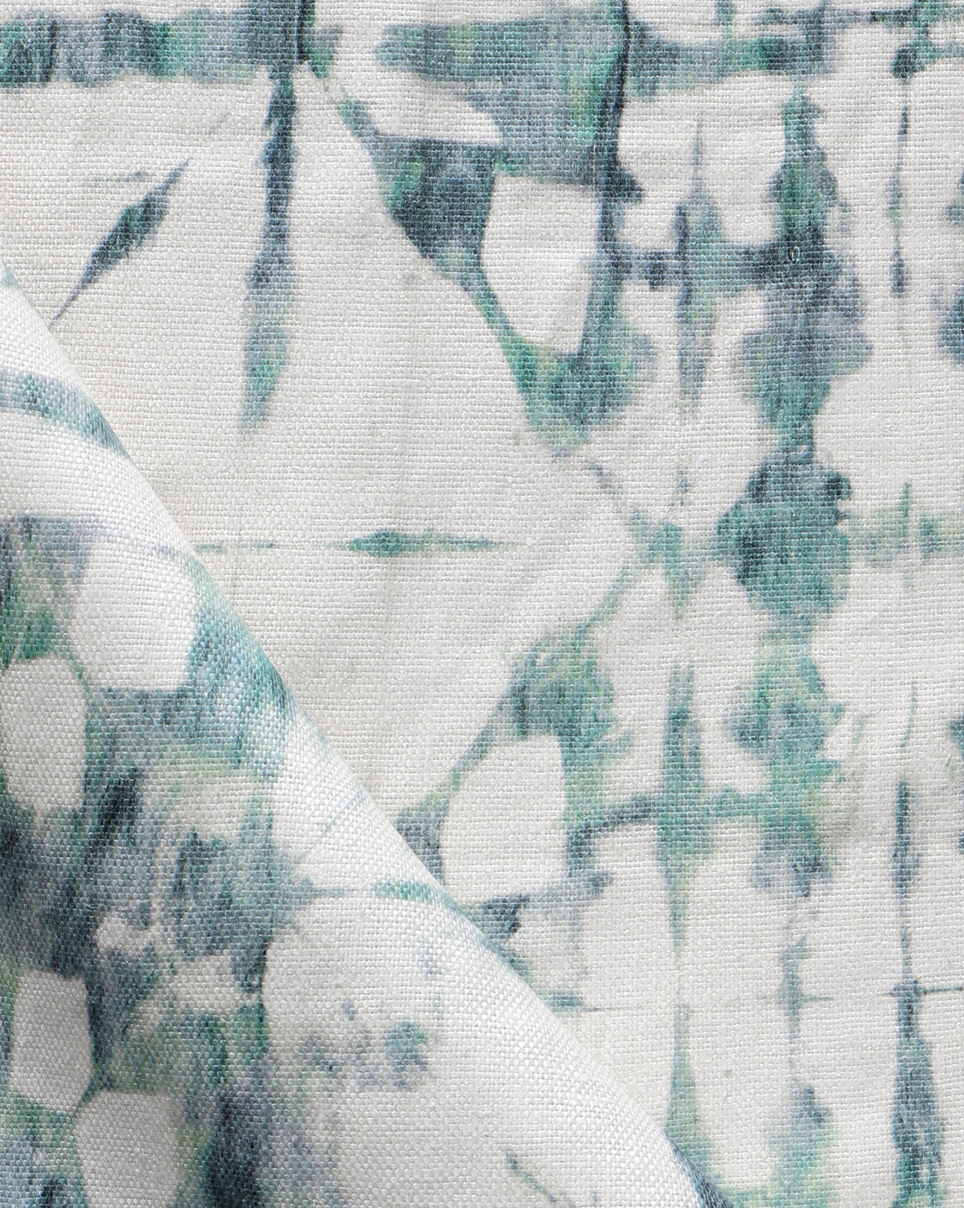 A close up of a Banda Fabric||Chloros using shibori tie-dye techniques.