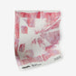 A luxury Banda Fabric||Persimmon featuring a pink and white painting on a white background is created using tie-dye techniques.