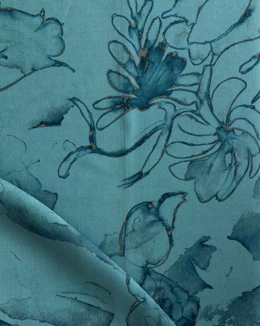 A close up of a teal fabric with Belize Blooms Fabric||Aquamarine flowers on it.