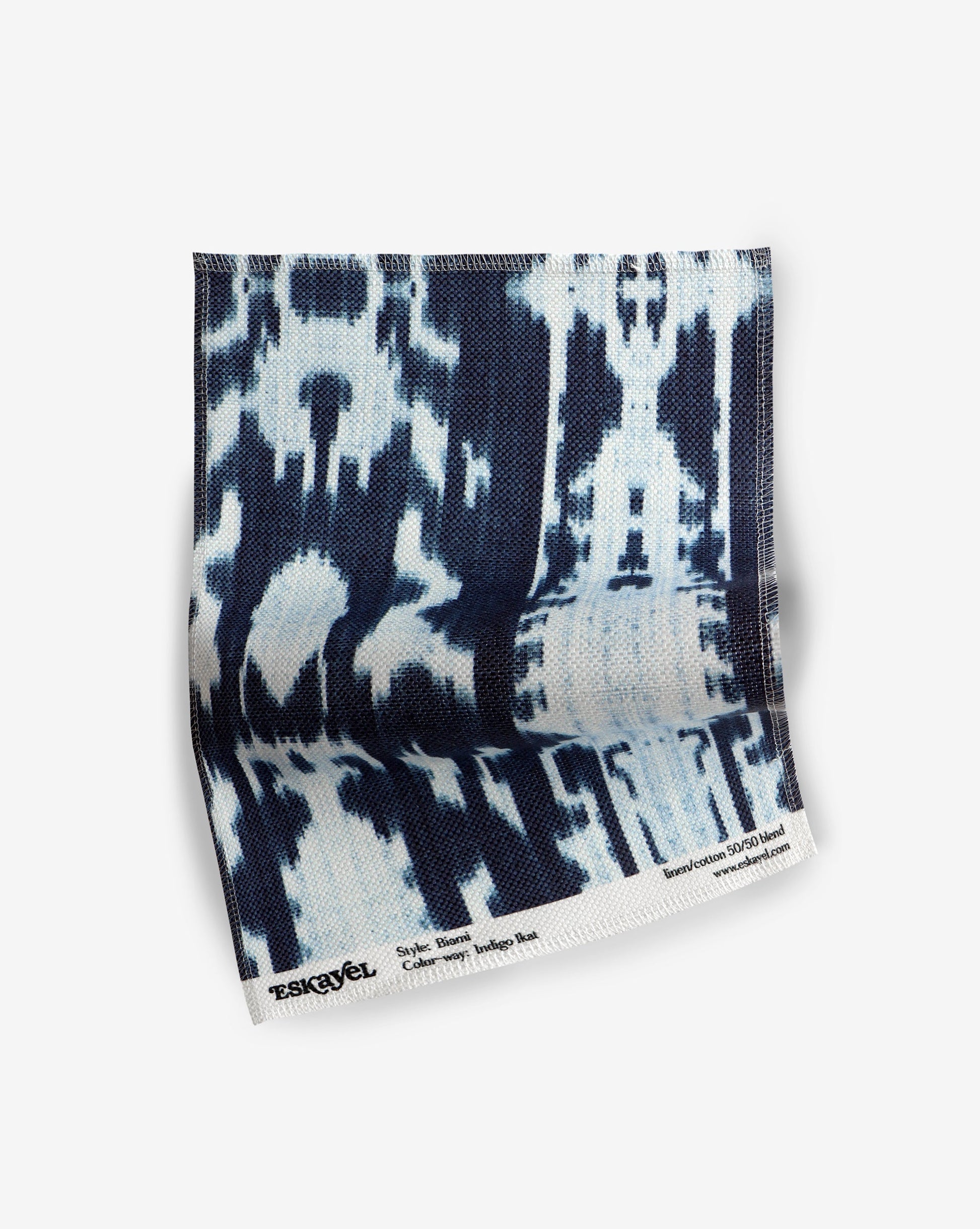 Order a sample of the Biami Fabric Sample||Indigo Ikat on a white background.
