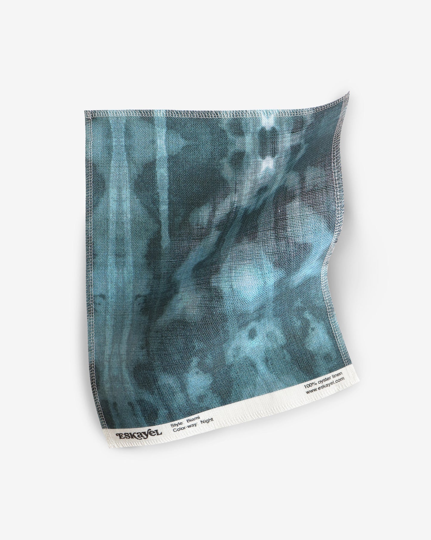 A blue and black tie dye pattern on a white background made with Biami Fabric Night