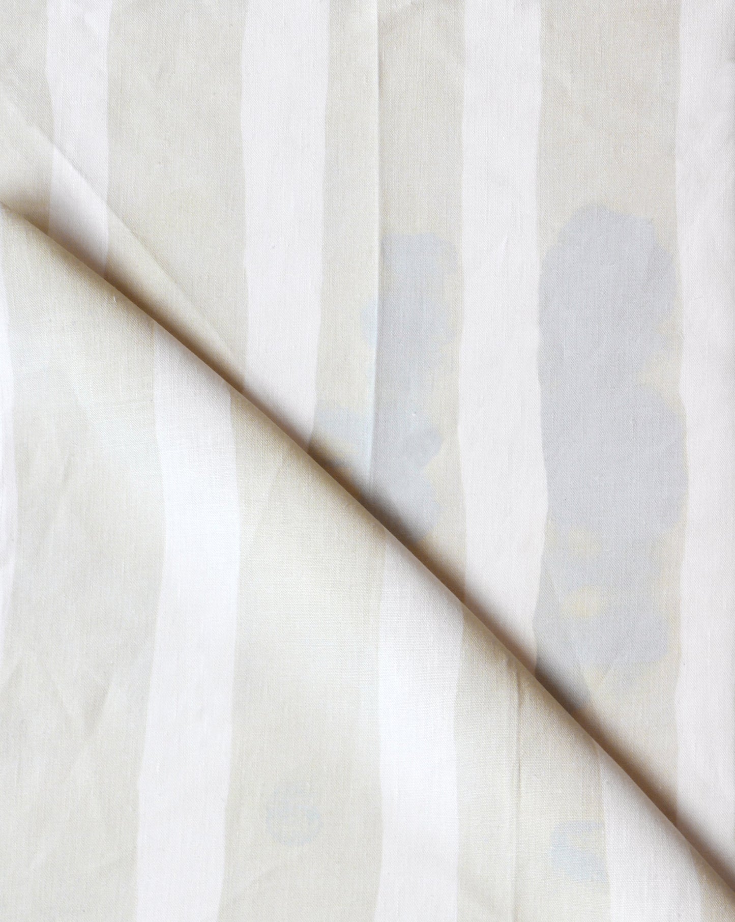 A close up of the Bold Stripe Fabric||Sand from the Eskayel Stripes Collection.