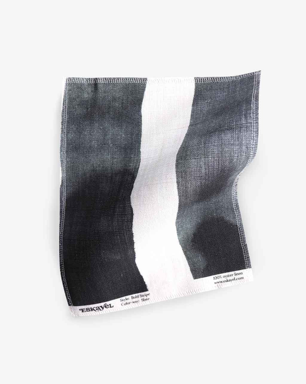 An image of a Bold Stripe Fabric Sample Slate hanging on a white surface