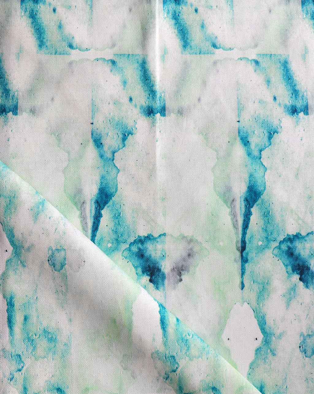 A blue and white fabric with a watercolor Bungalow Fabric pattern