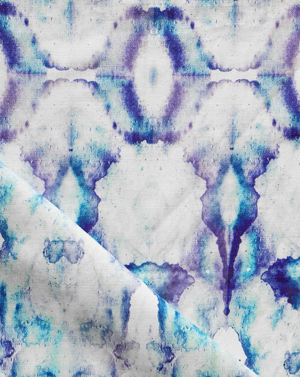 An image of a blue and white tie dyed Bungalow Fabric Royal featuring Eskayel watercolor designs