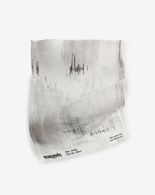 Abstract Cherifia Blanca Fabric sample in grey shades with white and pops of black | Eskayel
