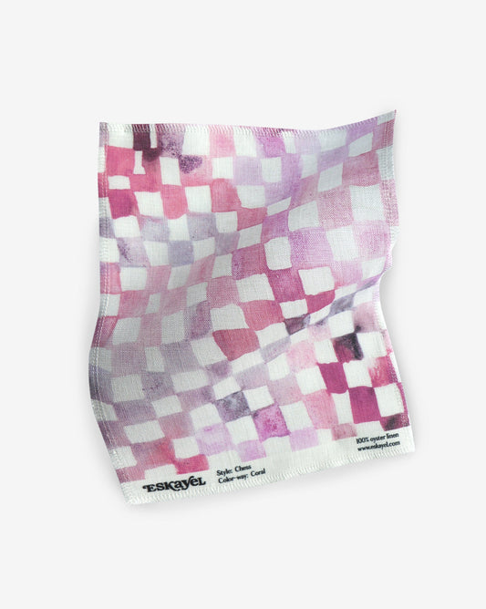 Watercolored Chess Coral Fabric sample in vibrant pink hues and flecks of purple | Eskayel