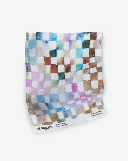 Watercolored Chess Multi Fabric sample in rich colors such as brown, blue, green, pink, purple, and more | Eskayel