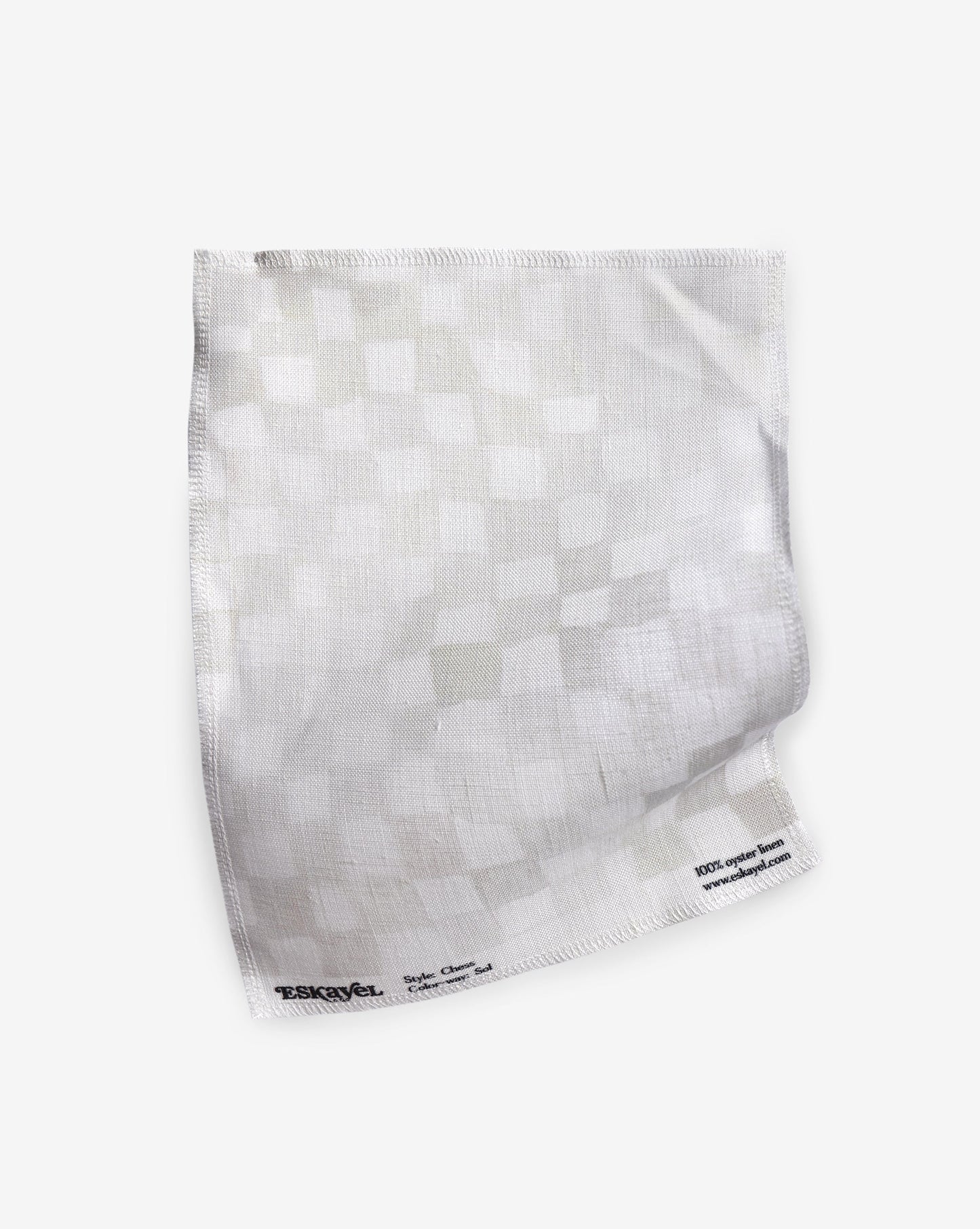 A white Chess Fabric Sol fabric with a checkered pattern motif