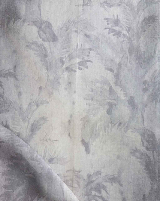 A white and gray Cocos Fabric||Bare with a floral pattern.