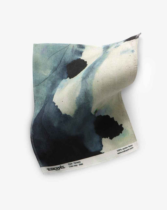 a sample of a Dynasty Fabric Sample Slate fabric with a painting of a panda on it