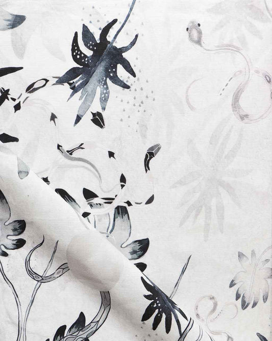 A white Edera Fabric Ice pattern with black and white flowers