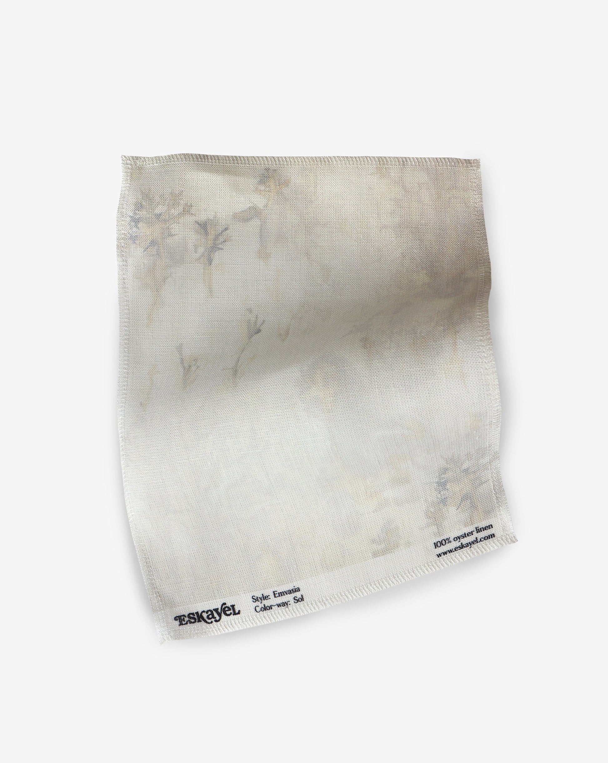 A piece of fabric with a white background is a canvas for the Emvasia Fabric Sol keywords on display