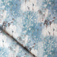 A blue and white Thalassa fabric with birds on it