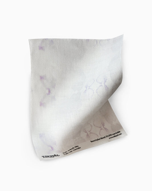 An Icelandic Mist Fabric Sample with Lavender flowers on it