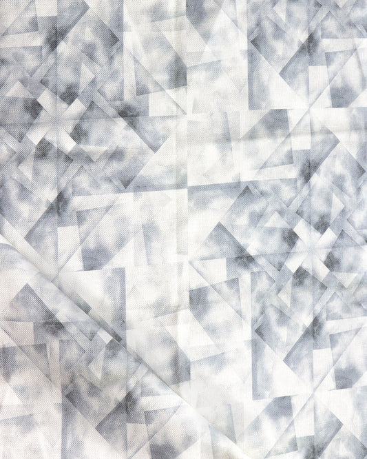A white and gray Kalos Fabric with luxurious geometric designs on it