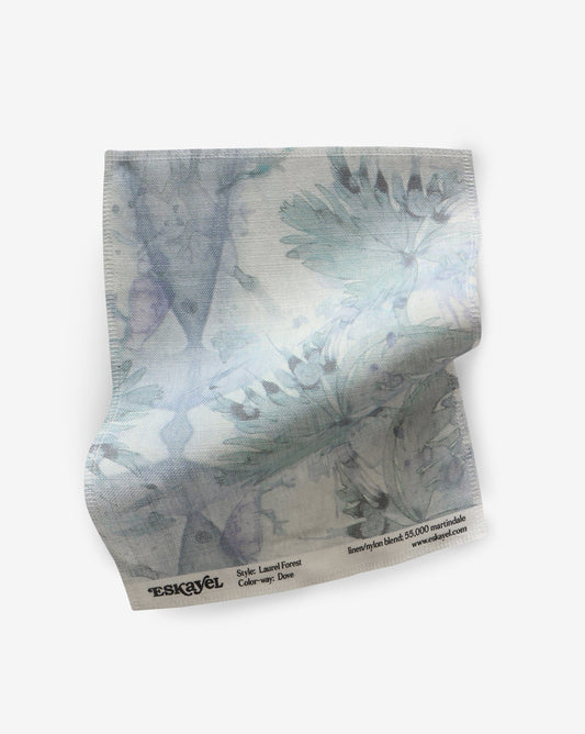 A blue and white floral Laurel Forest Fabric Sample Dove fabric