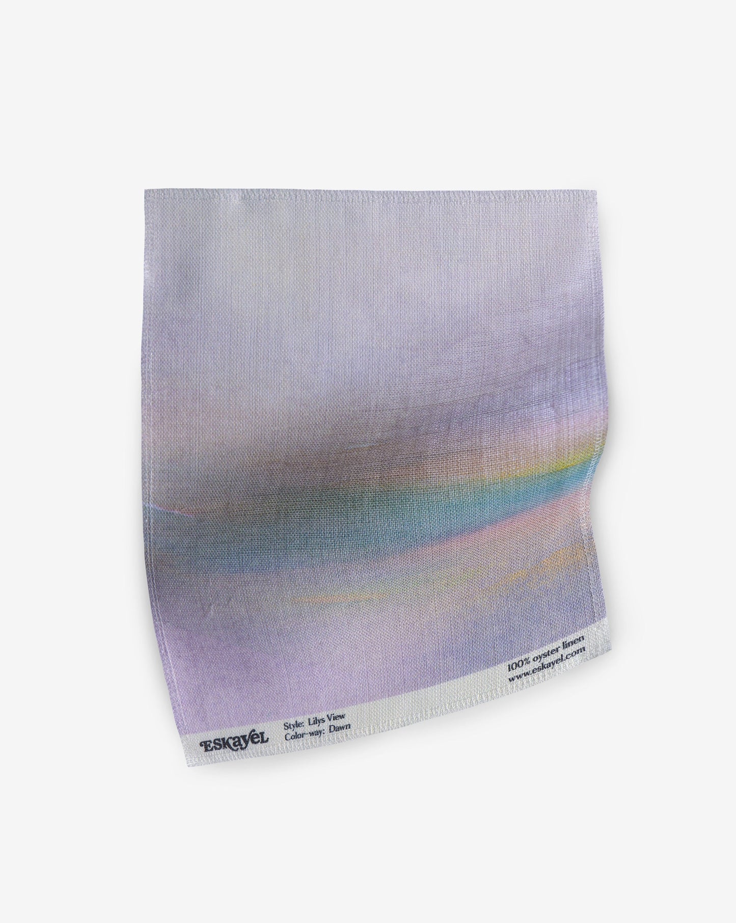 A piece of Lily's View Fabric||Dawn with a rainbow on it.