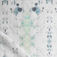 A close up of a blue and green tie dyed Nyanza fabric.