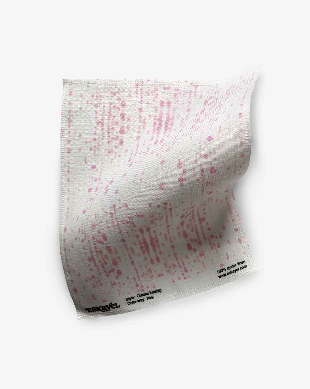 An Omaha Kinship Fabric Sample Pink fabric with dots on it